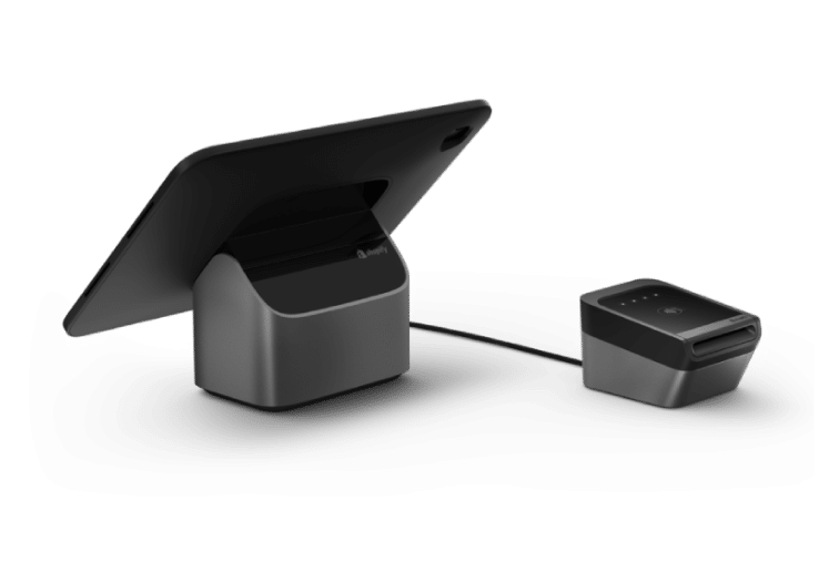 Shopify POS tablet terminal with a stand a small card reader